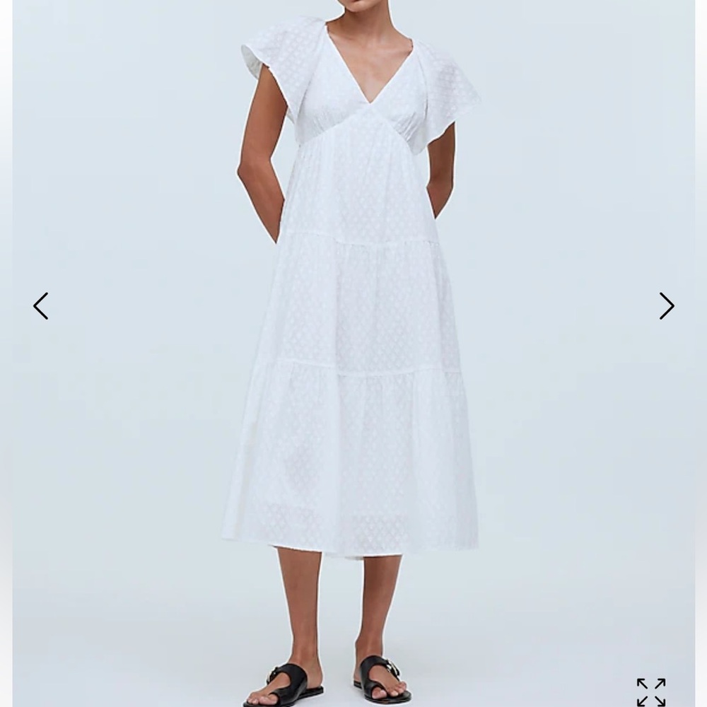 NWT (hasn’t been taken out of the shipping packaging) Flutter Sleeve White Dress